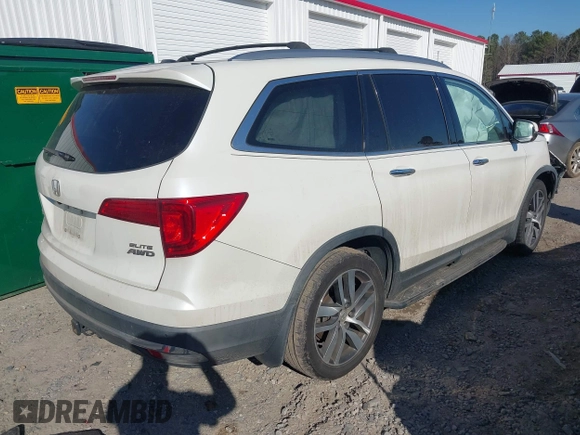 2016 Honda Pilot Elite with VIN 5FNYF6H05GB019292, listed as a IAAI auction lot 41668830 with 170,718 mi miles. Bid and sale history available at carsss.com. Image 4.