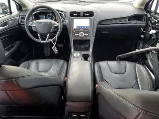 2020 Ford Fusion Plug-In Hybrid Titanium with VIN 3FA6P0SU5LR261527, listed as a Copart auction lot 86363274 with 76,210 mi miles and Salvage Title. Bid and sale history available at carsss.com. Image 8.
