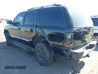 2004 Chevrolet Tahoe LS with VIN 1GNEC13T94J331286, listed as a IAAI auction lot 40691697 with 211,544 mi miles. Bid and sale history available at carsss.com. Image 3.