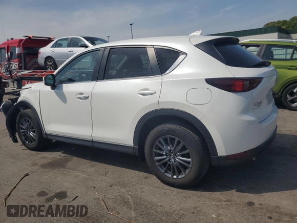 2021 Mazda CX-5 Touring with VIN JM3KFBCM7M0386995, listed as a Copart auction lot 55255784 with 43,561 mi miles and Salvage Title. Bid and sale history available at carsss.com. Image 2.