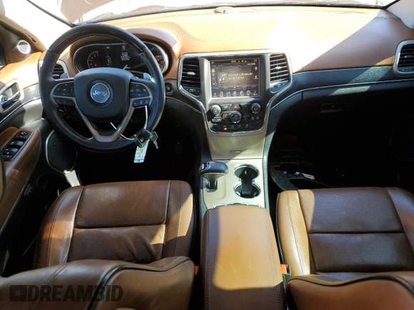 2015 Jeep Grand Cherokee Summit с VIN 1C4RJFJG9FC914516, выставлен на аукционе Copart как лот 57410505 с пробегом 130 350 миль миль и Списание • Salvage title. История ставок и продаж доступна на DreamBid. Изображение 8.