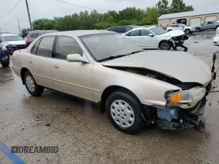 1995 Toyota Camry LE with VIN 4T1SK12E8SU548790, listed as a Copart auction lot 59390925 with 207,392 mi miles and Salvage title. Bid and sale history available at DreamBid. Image 4.