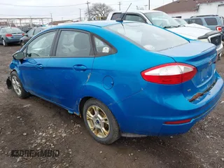 2014 Ford Fiesta SE with VIN 3FADP4BJ0EM186286, listed as a IAAI auction lot 42046848 with 131,848 mi miles and . Bid and sale history available at DreamBid. Image 3.