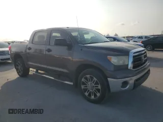2011 Toyota Tundra with VIN 5TFEM5F16BX034798, listed as a Copart auction lot 59337445 with 309,899 mi miles and Clean title. Bid and sale history available at DreamBid. Image 4.