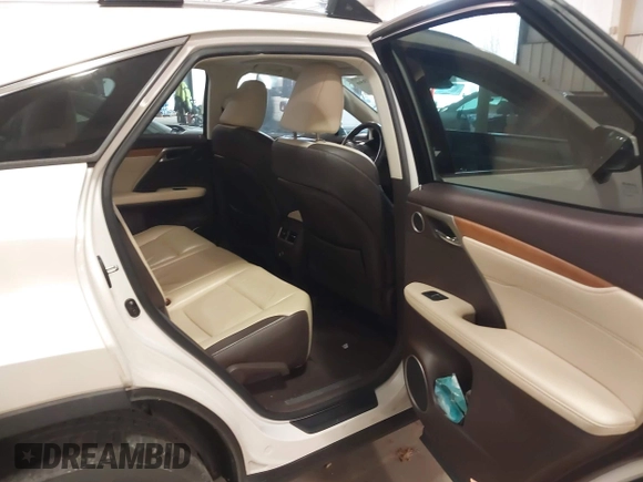 2018 Lexus RX 350 z VIN 2T2BZMCA5JC144530, wystawiony jako IAAI lot #41417396 z przebiegiem 97 860 mil mil oraz . Historia ofert i sprzedaży dostępna na DreamBid. Obrazek 8.