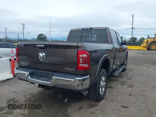 2020 Ram 2500 Laramie z VIN 3C6UR5FL5LG249102, wystawiony jako IAAI lot #41414195 z przebiegiem 42 044 mil mil oraz . Historia ofert i sprzedaży dostępna na DreamBid. Obrazek 4.