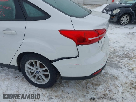 2017 Ford Focus SE with VIN 1FADP3F20HL235067, listed as a IAAI auction lot 41580300 with 79,009 mi miles and . Bid and sale history available at DreamBid. Image 13.