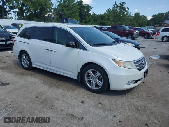 2013 Honda Odyssey Touring with VIN 5FNRL5H99DB052538, listed as a Copart auction lot 66310875 with 192,052 mi miles and Clean title. Bid and sale history available at DreamBid. Image 4.