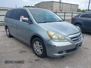2005 Honda Odyssey EX-L with VIN 5FNRL38615B079423, listed as a IAAI auction lot 42479287 with 219,688 mi miles and . Bid and sale history available at DreamBid. Image 1.