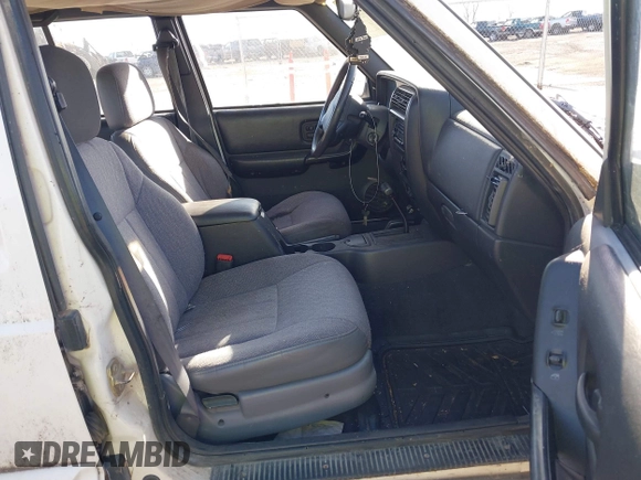 1999 Jeep Cherokee Sport with VIN 1J4FF68S0XL628564, listed as a IAAI auction lot 41508373 with 244,596 mi miles and . Bid and sale history available at DreamBid. Image 5.