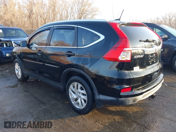 2015 Honda CR-V EX-L with VIN 2HKRM4H75FH671079, listed as a IAAI auction lot 41132774 with 117,188 mi miles and . Bid and sale history available at DreamBid. Image 3.