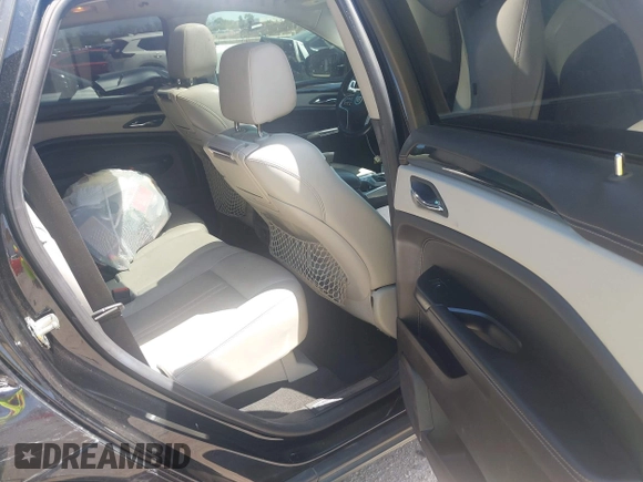 2013 Cadillac SRX Premium Collection with VIN 3GYFNJE33DS560639, listed as a IAAI auction lot 42015863 with 161,270 mi miles and . Bid and sale history available at DreamBid. Image 8.