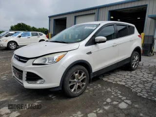 2013 Ford Escape SEL z VIN 1FMCU9HX7DUB22002, wystawiony jako Copart lot #60121255 z przebiegiem 157 353 mil mil oraz Szkoda całkowita • Salvage title. Historia ofert i sprzedaży dostępna na DreamBid. Obrazek 1.