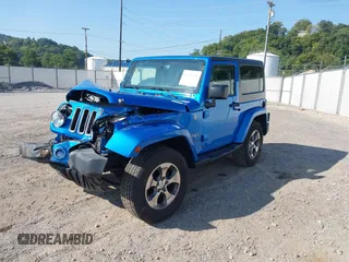 2016 Jeep Wrangler Sahara with VIN 1C4AJWBG9GL112139, listed as a IAAI auction lot 40286816 with 54,568 mi miles and . Bid and sale history available at DreamBid. Image 2.