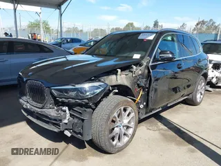 2023 BMW X5 xDrive45e z VIN 5UXTA6C01P9P71810, wystawiony jako IAAI lot #42014507 z przebiegiem 48 174 mil mil oraz . Historia ofert i sprzedaży dostępna na DreamBid. Obrazek 2.