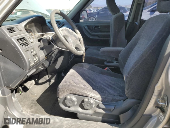 2000 Honda CR-V LX with VIN JHLRD1849YC047923, listed as a Copart auction lot 77041664 with 235,211 mi miles and Salvage Title. Bid and sale history available at carsss.com. Image 7.