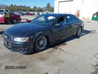 2017 Audi A8 L Sport with VIN WAU43AFDXHN003685, listed as a IAAI auction lot 41264314 with 114,828 mi miles. Bid and sale history available at carsss.com. Image 2.