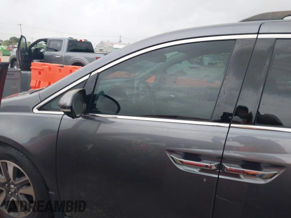 2016 Honda Odyssey Touring Elite with VIN 5FNRL5H96GB063176, listed as a IAAI auction lot 42157604 with 106,177 mi miles. Bid and sale history available at carsss.com. Image 14.