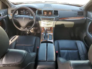 2014 Lincoln MKS with VIN 1LNHL9EK6EG604428, listed as a Copart auction lot 59758884 with 122,833 mi miles and Salvage Title. Bid and sale history available at carsss.com. Image 8.