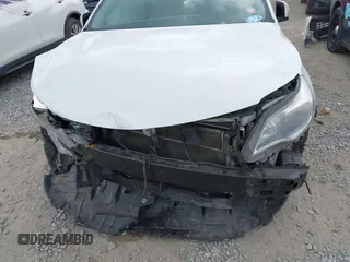 2016 Toyota Avalon XLE Premium z VIN 4T1BD1EB0GU056337, wystawiony jako IAAI lot #42110091 z przebiegiem 296 715 mil mil oraz . Historia ofert i sprzedaży dostępna na DreamBid. Obrazek 6.