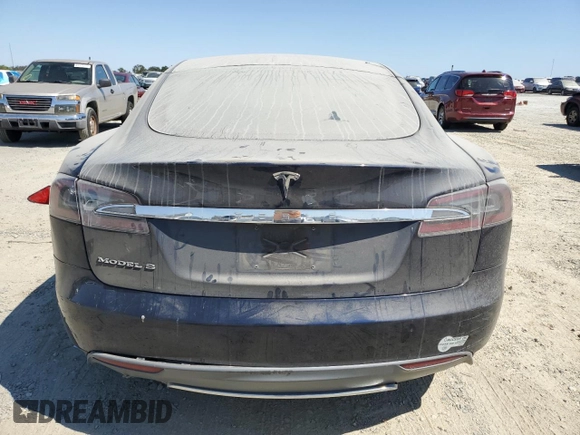 2013 Tesla Model S with VIN 5YJSA1AC9DFP10400, listed as a Copart auction lot 64096555 with 165,166 mi miles and Salvage title. Bid and sale history available at DreamBid. Image 6.