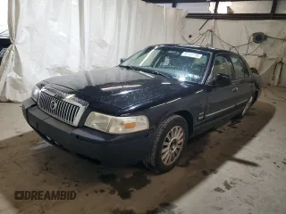 2010 Mercury Grand Marquis LS z VIN 2MEBM7FV6AX628705, wystawiony jako Copart lot #52185105 z przebiegiem 139 485 mil mil oraz Szkody całkowita. Historia ofert i sprzedaży dostępna na DreamBid. Obrazek 1.