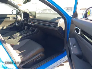 2025 Honda Civic Sport Touring z VIN 19XFL4H95SE006866, wystawiony jako IAAI lot #41640900 z przebiegiem 1 748 mil mil oraz . Historia ofert i sprzedaży dostępna na DreamBid. Obrazek 5.