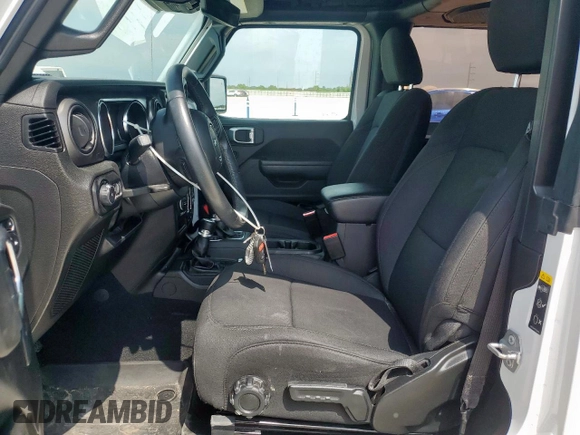 2022 Jeep Wrangler Sport S with VIN 1C4GJXAG5NW259605, listed as a Copart auction lot 57659775 with 14,864 mi miles and Salvage title. Bid and sale history available at DreamBid. Image 7.