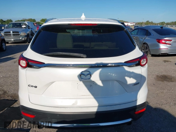 2019 Mazda CX-9 Grand Touring with VIN JM3TCADY3K0305173, listed as a IAAI auction lot 41672448 with 132,265 mi miles. Bid and sale history available at carsss.com. Image 16.