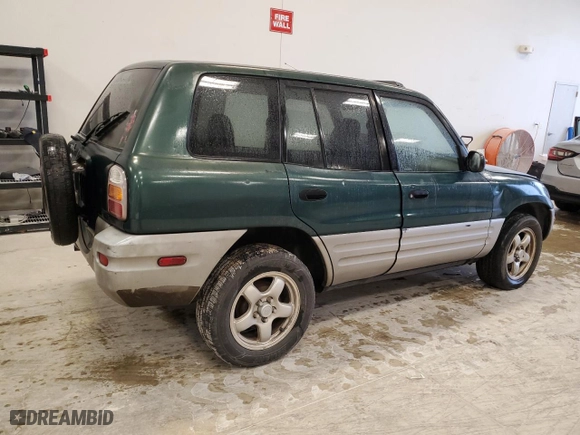 1998 Toyota RAV4 with VIN JT3GP10V9W7040240, listed as a Copart auction lot 88218835 with 309,410 mi miles and Clean Title. Bid and sale history available at carsss.com. Image 3.