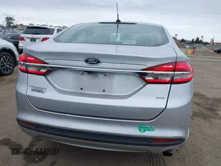 2017 Ford Fusion Energi SE with VIN 3FA6P0PU9HR354096, listed as a IAAI auction lot 42064703 with 69,601 mi miles. Bid and sale history available at carsss.com. Image 16.