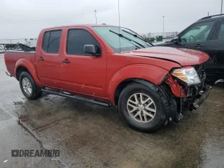 2015 Nissan Frontier SV with VIN 1N6AD0ER3FN717050, listed as a Copart auction lot 54595625 with 123,698 mi miles and Salvage title. Bid and sale history available at DreamBid. Image 4.