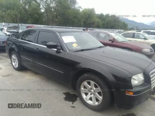 2005 Chrysler 300 Touring with VIN 2C3JA53G85H684276, listed as a IAAI auction lot 30711516 with 76,445 mi miles and . Bid and sale history available at carsss.com. Image 1.