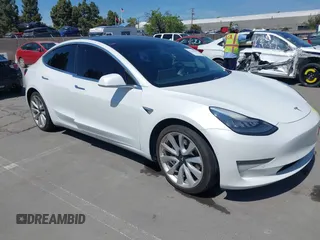 2020 Tesla Model 3 Long Range z VIN 5YJ3E1EB3LF621348, wystawiony jako IAAI lot #42121895 z przebiegiem Nie podano mil oraz . Historia ofert i sprzedaży dostępna na DreamBid. Obrazek 1.