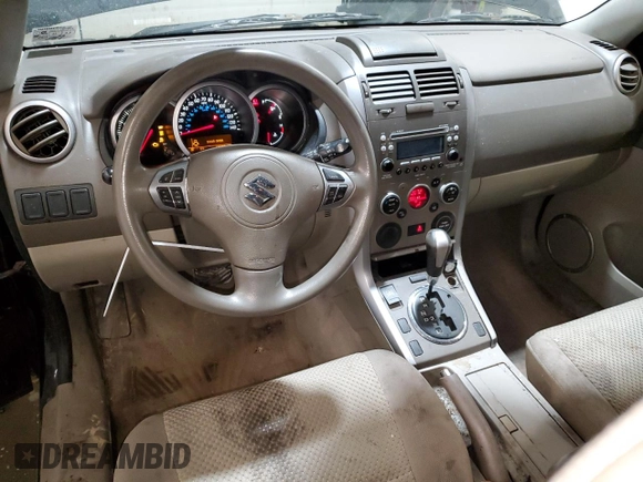 2011 Suzuki Grand Vitara Premium z VIN JS3TD0D24B4103142, wystawiony jako Copart lot #43715135 z przebiegiem 170 422 mil mil oraz Szkoda całkowita • Salvage title. Historia ofert i sprzedaży dostępna na DreamBid. Obrazek 8.