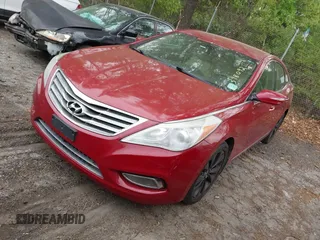 2014 Hyundai Azera Limited z VIN KMHFH4JG8EA398092, wystawiony jako IAAI lot #42046561 z przebiegiem 171 270 mil mil oraz . Historia ofert i sprzedaży dostępna na DreamBid. Obrazek 2.