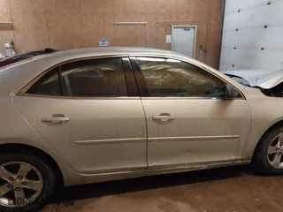 2013 Chevrolet Malibu LS with VIN 1G11B5SA6DF256933, listed as a IAAI auction lot 41598872 with 142,931 mi miles. Bid and sale history available at carsss.com. Image 13.