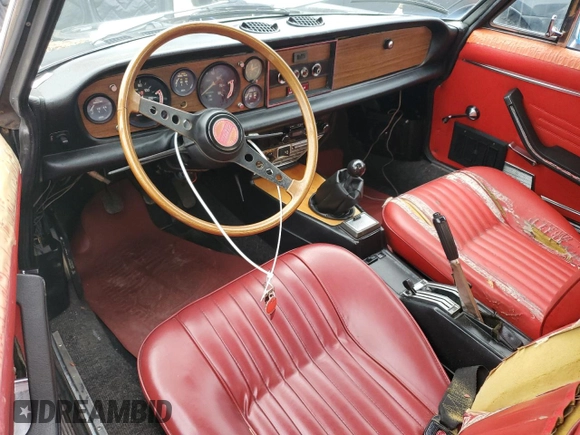 1975 FIAT 124 Spider z VIN 124CS10095845, wystawiony jako Copart lot #86344634 z przebiegiem 86 863 mil mil oraz Czysty tytuł • Clean title. Historia ofert i sprzedaży dostępna na DreamBid. Obrazek 8.