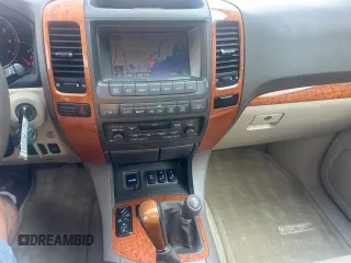 2005 Lexus GX 470 z VIN JTJBT20X050076167, wystawiony jako Copart lot #59916595 z przebiegiem 297 768 mil mil oraz Czysty tytuł • Clean title. Historia ofert i sprzedaży dostępna na DreamBid. Obrazek 9.