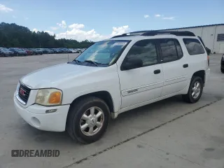 2003 GMC Envoy SLE z VIN 1GKES16S336149703, wystawiony jako Copart lot #61565055 z przebiegiem 233 846 mil mil oraz Szkoda całkowita • Salvage title. Historia ofert i sprzedaży dostępna na DreamBid. Obrazek 1.