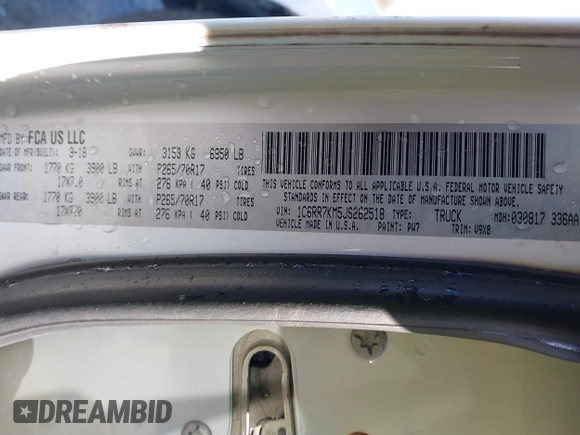 2018 Ram 1500 Tradesman with VIN 1C6RR7KM5JS262518, listed as a IAAI auction lot 41557220 with 145,989 mi miles and . Bid and sale history available at DreamBid. Image 9.