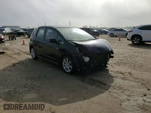 2010 Honda Fit Sport with VIN JHMGE8H44AS021590, listed as a Copart auction lot 52333635 with 137,770 mi miles and Salvage title. Bid and sale history available at DreamBid. Image 12.