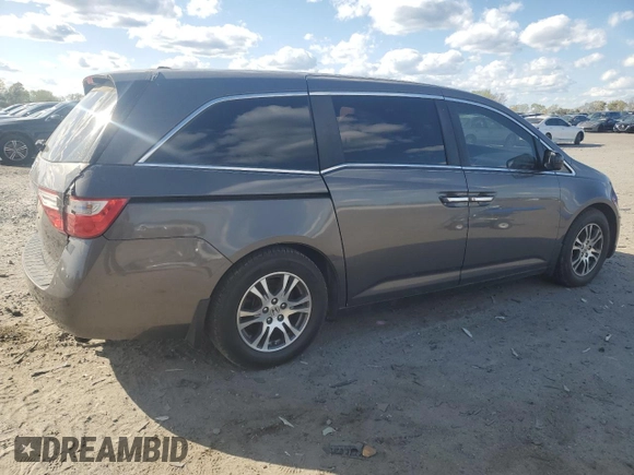 2012 Honda Odyssey EX-L with VIN 5FNRL5H64CB105215, listed as a Copart auction lot 53634125 with 149,310 mi miles and Salvage Title. Bid and sale history available at carsss.com. Image 3.