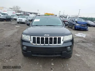 2011 Jeep Grand Cherokee Laredo with VIN 1J4RR4GGXBC511475, listed as a IAAI auction lot 41554620 with 164,361 mi miles. Bid and sale history available at carsss.com. Image 12.