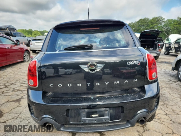2014 MINI Countryman S with VIN WMWZC3C56EWP25479, listed as a Copart auction lot 61197525 with 101,146 mi miles and Salvage title. Bid and sale history available at DreamBid. Image 6.