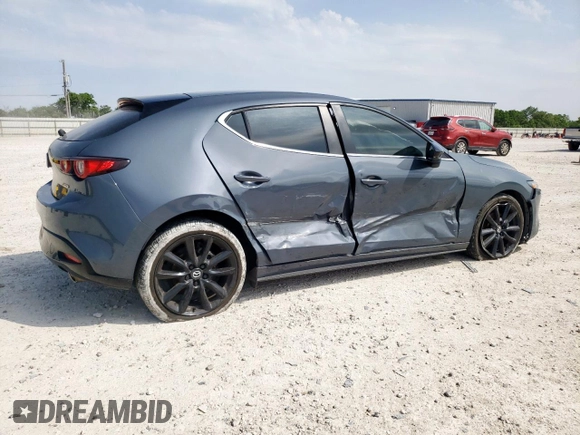 2024 Mazda 3 S Carbon Edition with VIN JM1BPBLM6R1657648, listed as a Copart auction lot 57335935 with 26,462 mi miles and Salvage title. Bid and sale history available at DreamBid. Image 3.