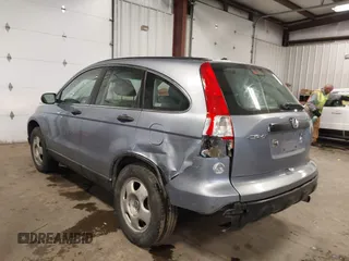 2009 Honda CR-V LX with VIN JHLRE48359C018488, listed as a IAAI auction lot 41824887 with 203,235 mi miles. Bid and sale history available at carsss.com. Image 3.