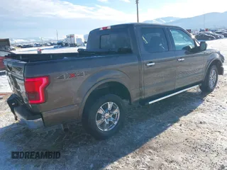 2015 Ford F-150 XLT with VIN 1FTEW1EP4FFC24409, listed as a IAAI auction lot 41306158 with 155,249 mi miles. Bid and sale history available at carsss.com. Image 4.