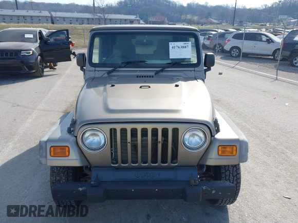2006 Jeep Wrangler Sport Right Hand Drive with VIN 1J4F449S46P716520, listed as a IAAI auction lot 41763887 with 236,816 mi miles. Bid and sale history available at carsss.com. Image 12.
