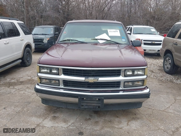 1999 Chevrolet Tahoe with VIN 1GNEC13R8XJ511786, listed as a IAAI auction lot 41538890 with 196,764 mi miles. Bid and sale history available at carsss.com. Image 6.
